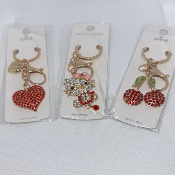 Keychains Gold and Red Trio. - Picture 2 of 3